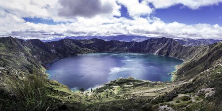 Panoramic view of a lake within a volcano crater named Quilotoa. South America, Ecuadorの写真素材