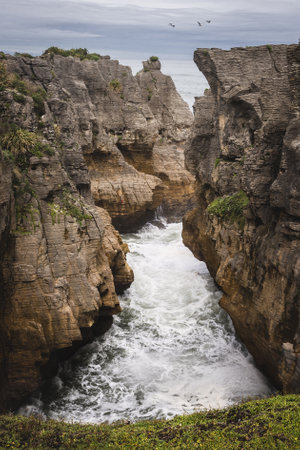 Pancake rocks, famous travel destination in New Zealand. Vertical photography.の写真素材