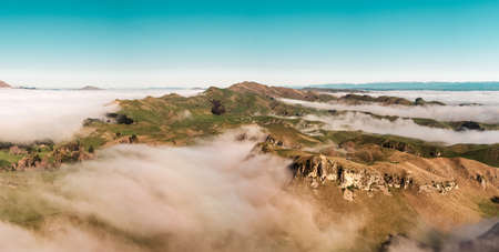 Morning full of fog at the Te Mata Peak with the sight of Mount Erin. Hawke's Bay, New Zealand. Landscape photographyの写真素材