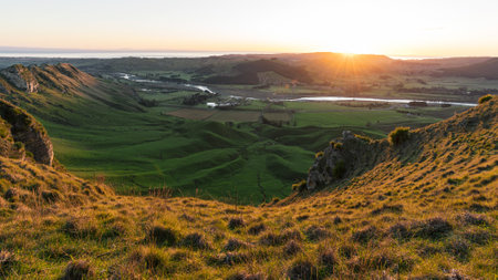 Beautiful sunrise at Te Mata Peak with the view of Tukituki river and the coast. Hawke's Bay, New Zealand.の写真素材