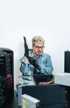 Man getting ready for working on computer repair service. portrait photographyの写真素材