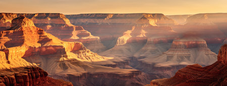 Golden sunset with the sun illuminates the rocks of Grand Canyon, United States. Golden Hour, The sun illuminates the rocks of the canyonの素材