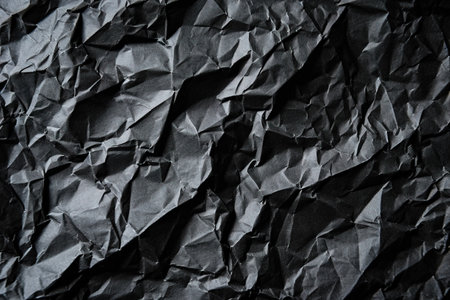 Black Recycled paper crumpled texture backgroundの素材