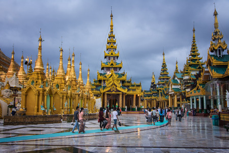 Walk to the Shwedagon Pagoda.the Shwedagon Pagoda with its golden stupa tall almost 100 meters That...
