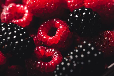 Blackberries and raspberries backgroundの写真素材