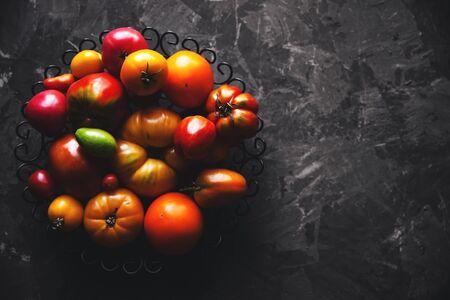 Tomatoes on a gray background, healthy food, vegetablesの写真素材