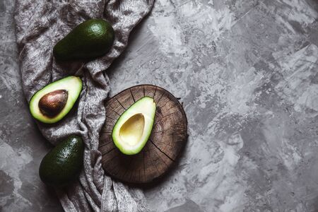 Avocado. Healthy food on the table. Rustic board.の写真素材
