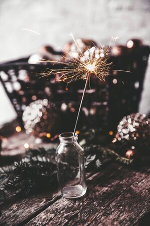 New Year's, Christmas background with Christmas sparklers and Christmas-tree toys. Copy space. Holidaysの写真素材