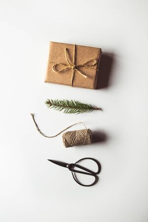 wrapping gifts concept for holiday on white background top view mock upの写真素材