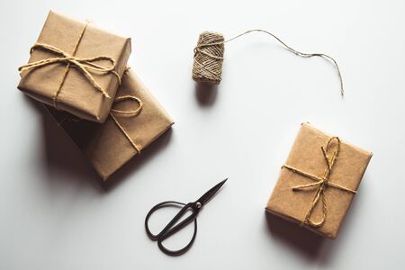 wrapping gifts concept for holiday on white background top view mock up
