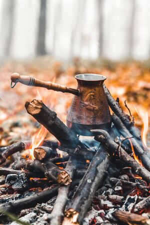 Making coffee at the stake. Make coffee or tea on the fire of nature. Burned fire. A place for fire....