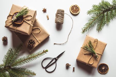 wrapping gifts concept for holiday on white background top view mock upの写真素材