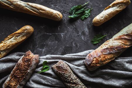 Baguette mix on a black background. French pastries, homemade.の写真素材