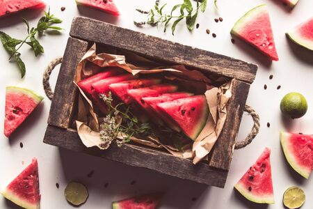sliced watermelon with mint and lime on a white background. Fresh food. Fruitsの写真素材