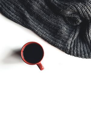 Autumn composition. Cup of coffee, sweater on white background. Autumnの写真素材