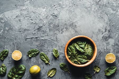 Green food background on stone table top view. Healthy food, vegan, eco products.の写真素材