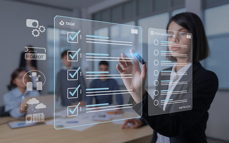 business, people and technology concept - close up of businesswoman drawing checklist on virtual screen over office backgroundの素材