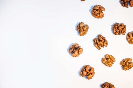 Stack of walnuts on white backgroundの写真素材