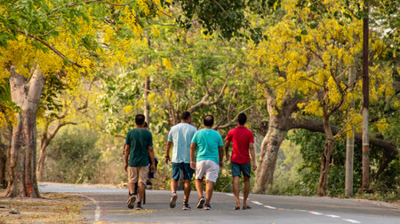 01 May 2022, Prayagraj Uttapradesh, A group of men out for a morning walk on a beautiful,...