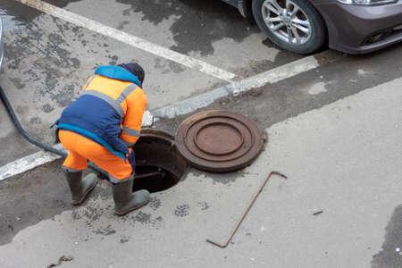 A men repairing of water supply system - Moscow, Russia, 25 April 2020のeditorial素材