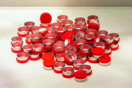 New pharmaceutical caps, metal and plastic, close-up viewの写真素材