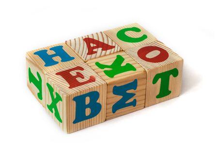 Wooden alphabet blocks. wooden cubes with letters isolated on white background.の写真素材