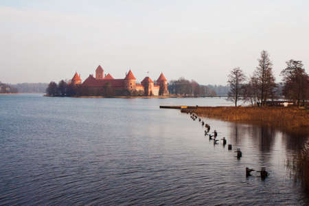 View of Trakai through the lake. Trakai Castle. Winter Trakai. Trakai in the late autumn. View of...