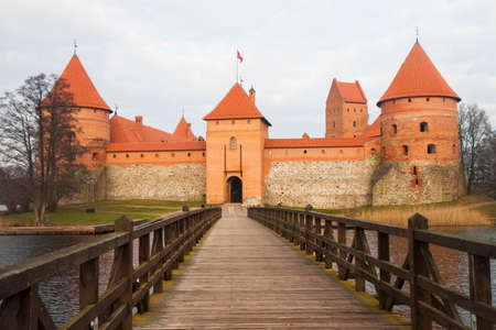 lock trakay in winter. lock trakai in late autumn. The bridge to Trakai. bridge across the lake.