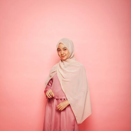 beautiful asian woman model posing on pink wall studio with different expressionのeditorial素材