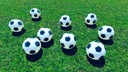 many soccer balls on the grass field 3d illustrationの写真素材