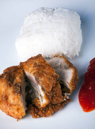 Fried Chicken with rice and chili sauceの写真素材