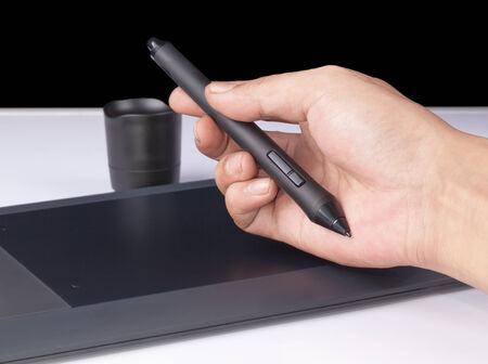 Hand holding Drawing Tablet for Graphic Designerの写真素材