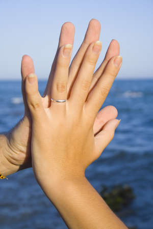 Comparing handsの写真素材