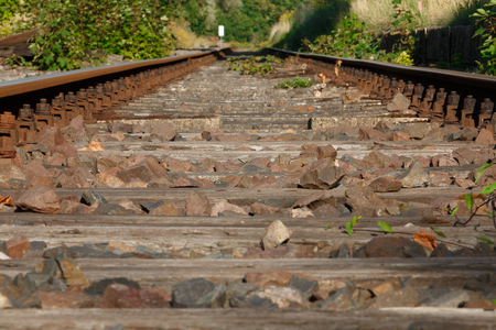 single train tracks on lost places trainstationの写真素材