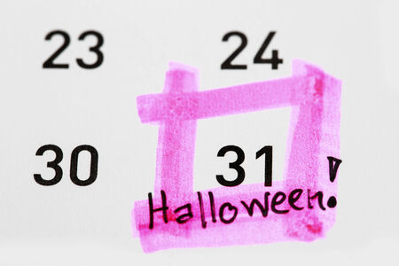 Halloween plan written on calendarの写真素材