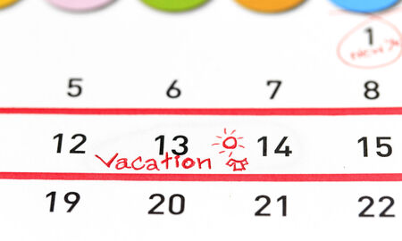 Vacation plan written on calendarの写真素材