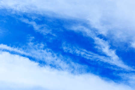 white cumulus clouds in blue sky