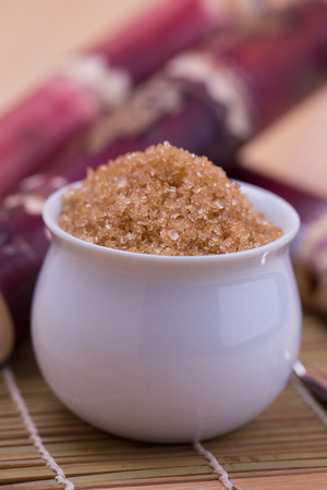 brown sugar in in a spoonの写真素材