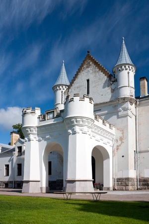 A photo of an entrance into a white castle located in South of Estonia のeditorial素材