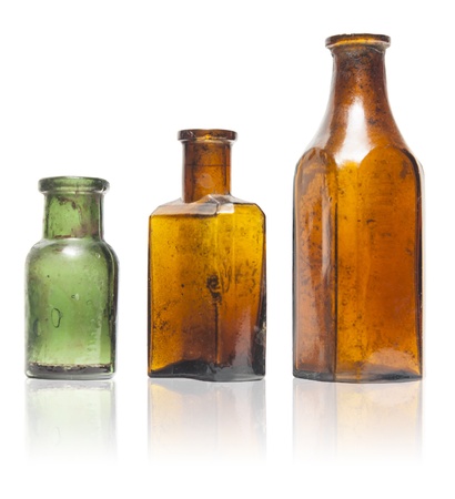 Isolated old style bottles in different shape and colorsの写真素材