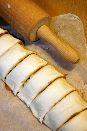  raw pies with jam waiting to be cooked in ovenの写真素材