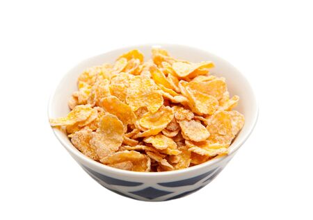 Bowl with cornflakes isolated to white background