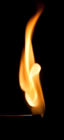 Shape of fire flame on flammable matchの写真素材