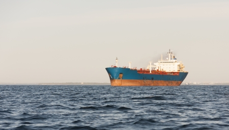 Old rusty chemical tanker anchored on seaの写真素材