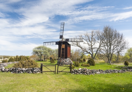 Windmill surrounded by garden made of stones in Saaremaa, Estonia.の写真素材