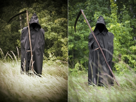 Death in black coat standing on a field scythe on hand