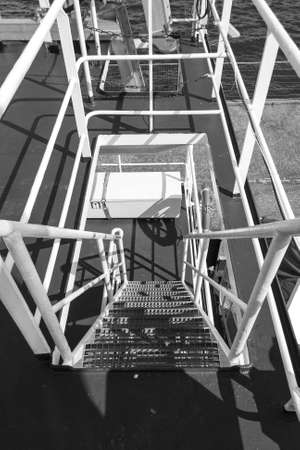 Metal stairs on an industrial shipの写真素材