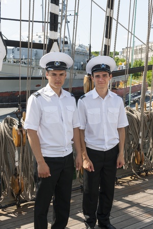TALLINN, ESTONIA - JULY 12, 2013: Two crew members of the Kruzenshtern or Krusenstern sail ship in solid uniforms on July 12, 2013 in Tallinn, Estoniaのeditorial素材