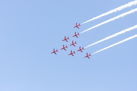 Tallinn, Estonia - June 23, 2014  Red Arrow aerobatic flight show with red fighter jets in Tallinn, Estonia on June 23, 2014のeditorial素材