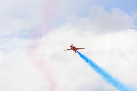 Tallinn, Estonia - June 23, 2014  Red Arrow aerobatic flight show with red fighter jets in Tallinn, Estonia on June 23, 2014のeditorial素材